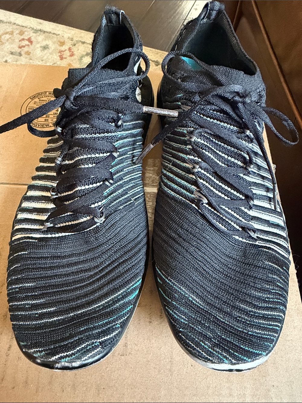 Nike Women’s Black and Teal Free Transform Flyknit